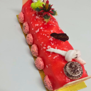 Buche mousse aux framboises le kg